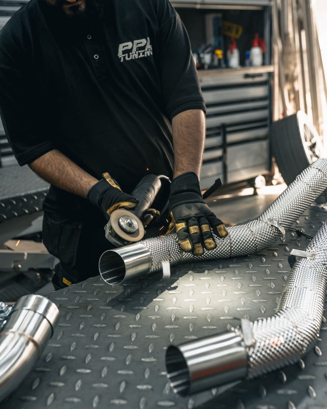Fitting a fabricated exhaust section