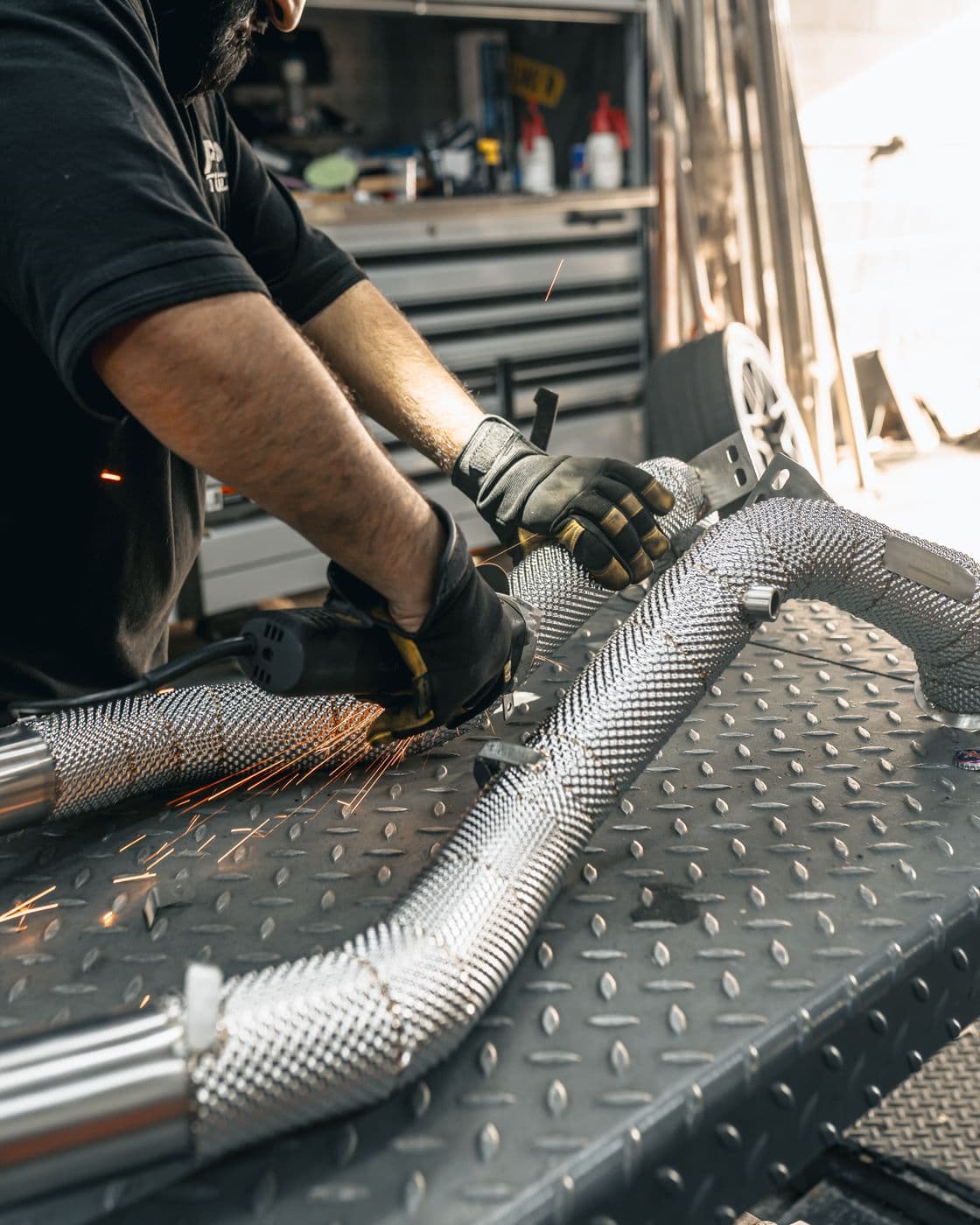 Cutting and finishing exhaust pipework in-house